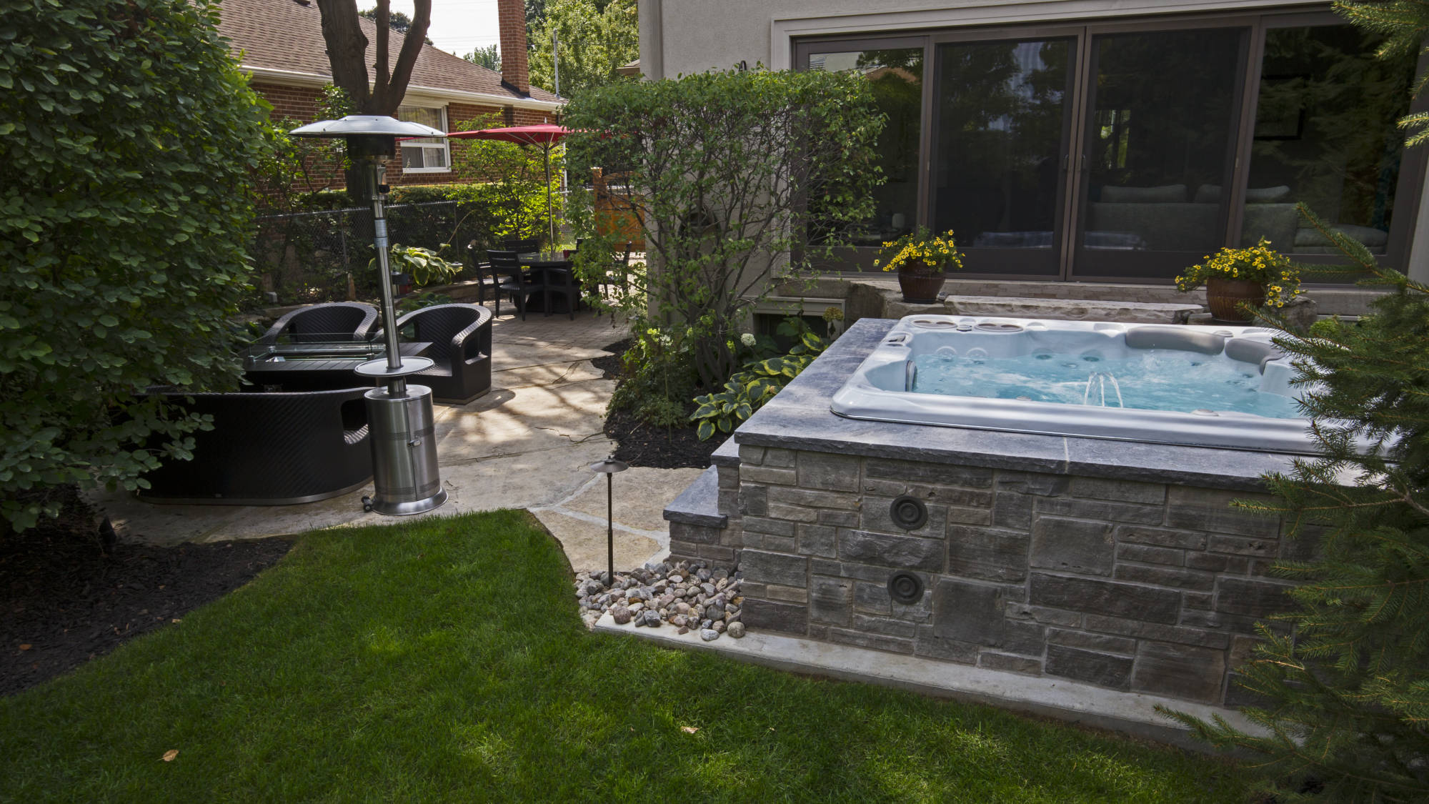Hot Tub in custom stone cabinet